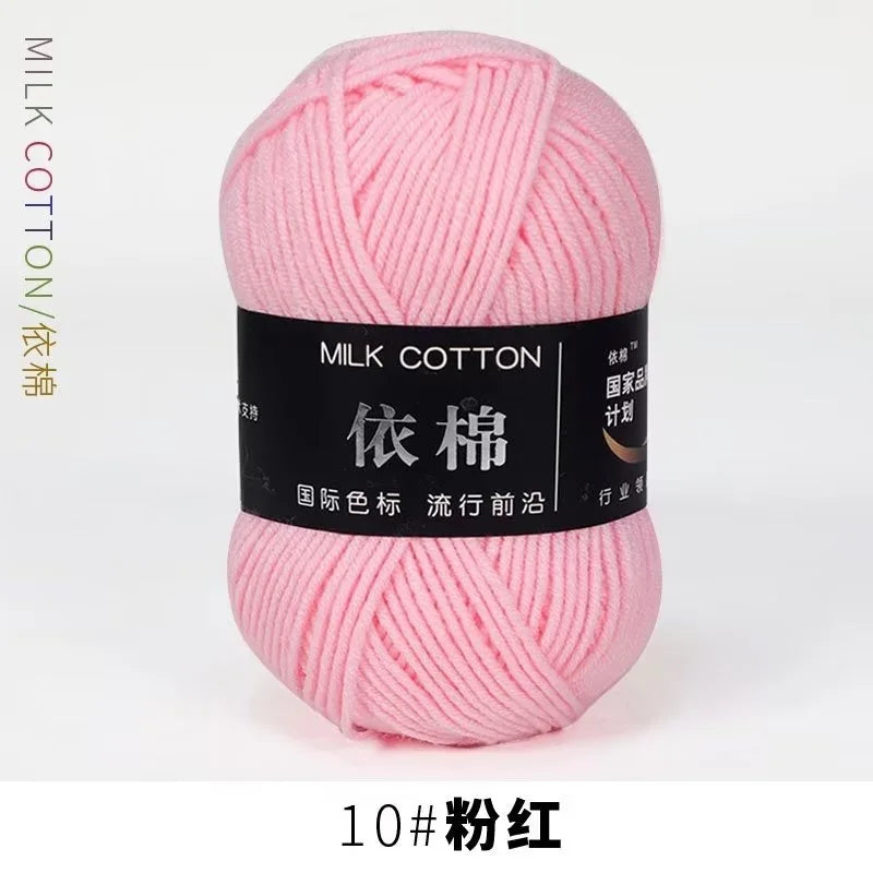 Pink milk cotton yarn skein labeled 10# 粉红 in a black box.