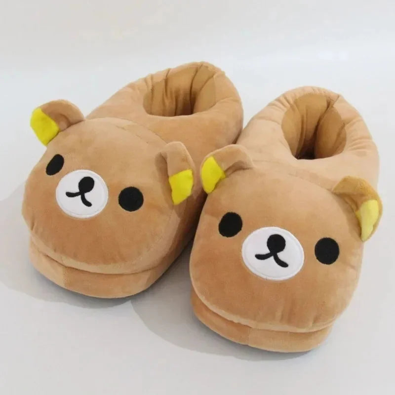 A pair of brown Rilakkuma plush indoor slippers with yellow accents.