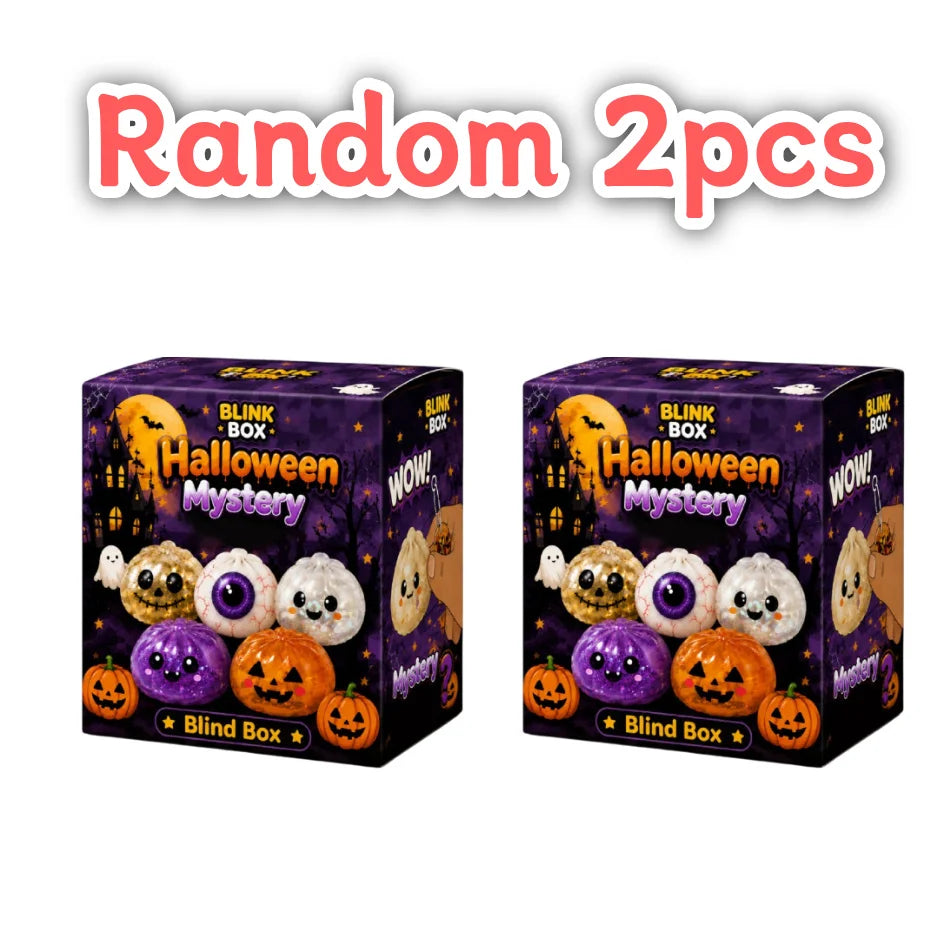 Two boxes of Halloween themed squishy stress relief toys labeled Random 2pcs