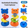 A set of eight basketball shooting track spinners in various colors and sizes.