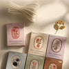 A display of Vintage Floral Stickers, showing various pink and brown floral designs on cardstock.