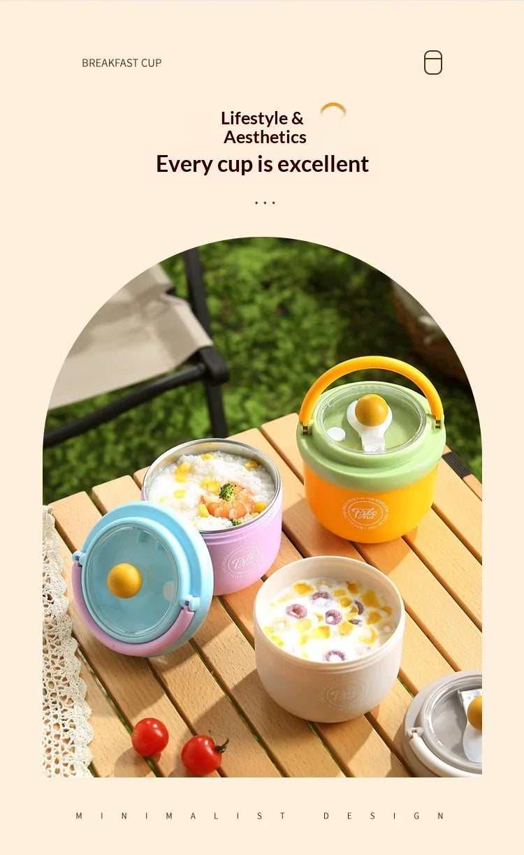 A set of yellow and green insulated stainless steel breakfast cups with lids placed on a wooden table outdoors.