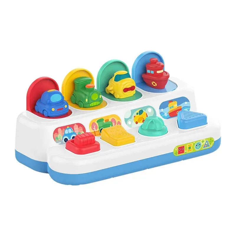 A white activity cube with six colorful, themed inserts for toddlers.