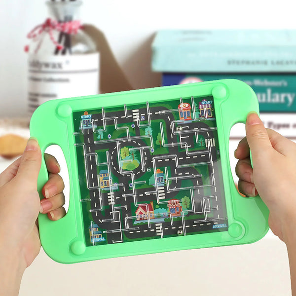 A hand holds a bright green 3D maze ball balancing puzzle game for kids and adults.