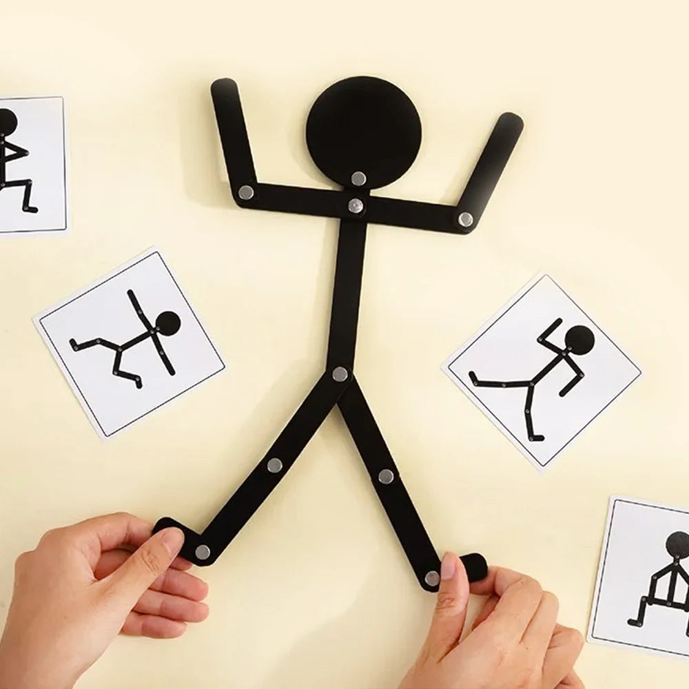 Hands are assembling a black stick puzzle toy set for children to practice fine motor skills.
