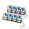 A set of LED fidget keychains with nine tactile buttons and silver chains.
