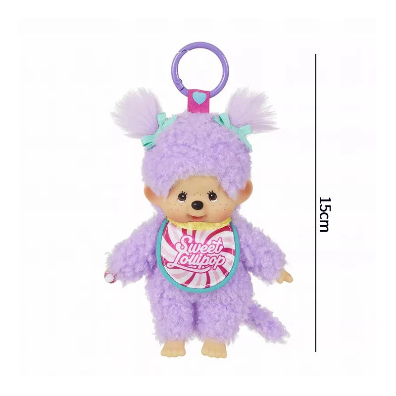 A purple Monchhichi plush keychain with pink accents and a purple ring.
