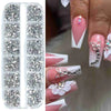 A collection of multi-size flat back acrylic rhinestones for nail art and DIY crafts displayed in a clear packaging.