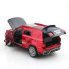 A red 1:36 scale die-cast metal SUV toy with opening doors and pull-back action.