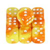 A set of ten mixed-color, translucent dice with orange and yellow swirls and white dots.