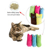 A fluffy tabby cat is shown next to several colorful, stuffed catnip toys.