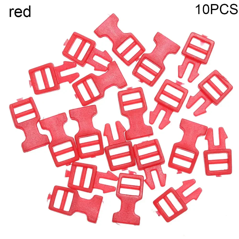 A pile of ten red mini plastic buckles for DIY crafts and outdoor gear.