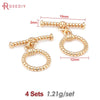 A set of four 18K gold round O-toggle clasps for bracelets and jewelry making.