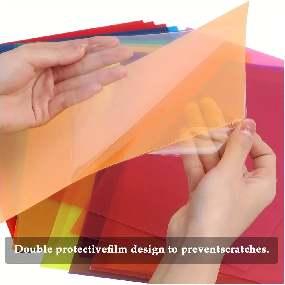 Hands holding a transparent colored PVC sheet demonstrating a double protective film design for scratch prevention.