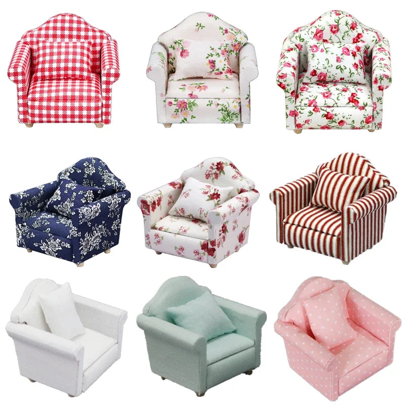 A collection of various fabric upholstered mini sofas and armchairs in floral, plaid, and solid colors for dollhouses