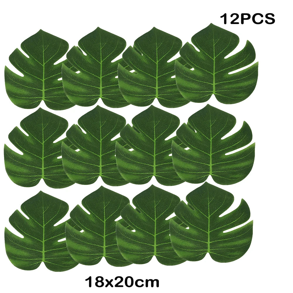 Twelve artificial tropical palm leaves measuring 18 by 20 cm for party decor