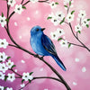 A blue bird perched on a branch surrounded by white blossoms against a pink background.