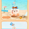A cute white plush character with a pink swimming ring is shown on a sandy beach.