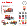 A box of Mag-Paradise fire station building tiles and road set with an electric car for building.