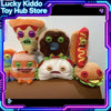 A collection of colorful, grotesque monster-themed plush toys and soft toys displayed in a store setting.