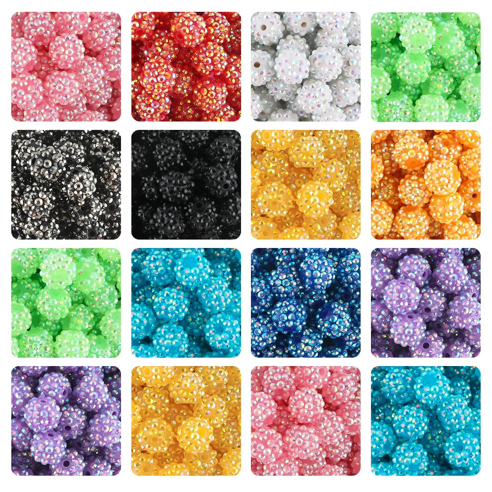 A grid of colorful resin beads with various glitter and pearl finishes for jewelry making