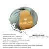 A ball of light green Merino wool yarn labeled Wool Yarn for knitting