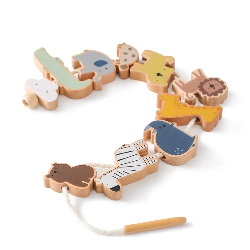 A set of wooden animal shapes used for threading and stacking toys.