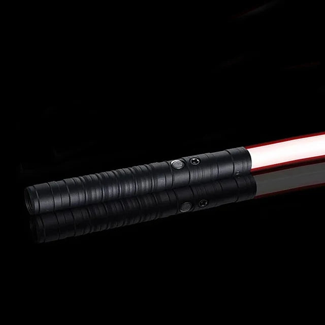 A black lightsaber with a red glowing blade and sound effects, shown against a dark background.
