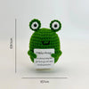 A handwoven crochet frog desk decor featuring bright green body and large eyes.