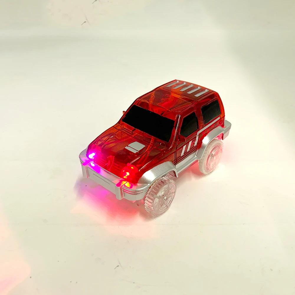 A red race track car toy with glowing LED lights and a silver chassis.