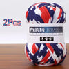 Two skeins of red, white, and blue striped soft chunky yarn for crochet and knitting