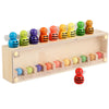 A wooden color matching toy featuring ten small, brightly colored, egg-shaped figures arranged in a row.