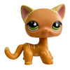 Orangefarbene Sammler-Katzenfigur mit großen grünen Augen und rosa Akzenten.