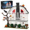 A set of building blocks depicting an Amityville Horror House model with seasonal decorations.