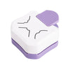 A white and purple triple-function corner embosser and cutter kit with a plastic handle.