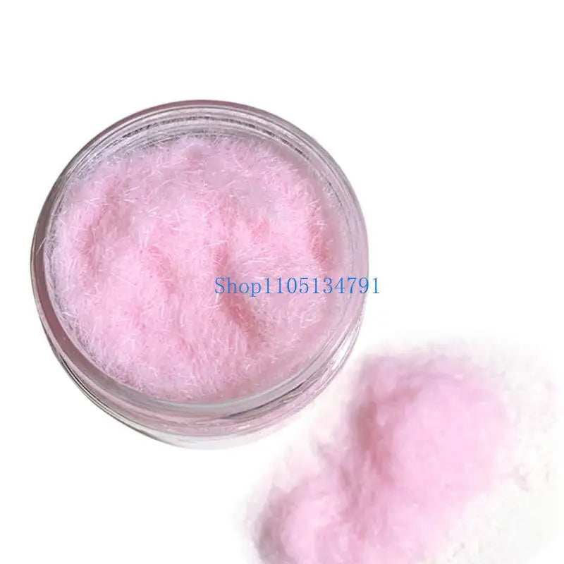 A clear jar filled with pink adhesive flocking powder for jewelry making and crafts.