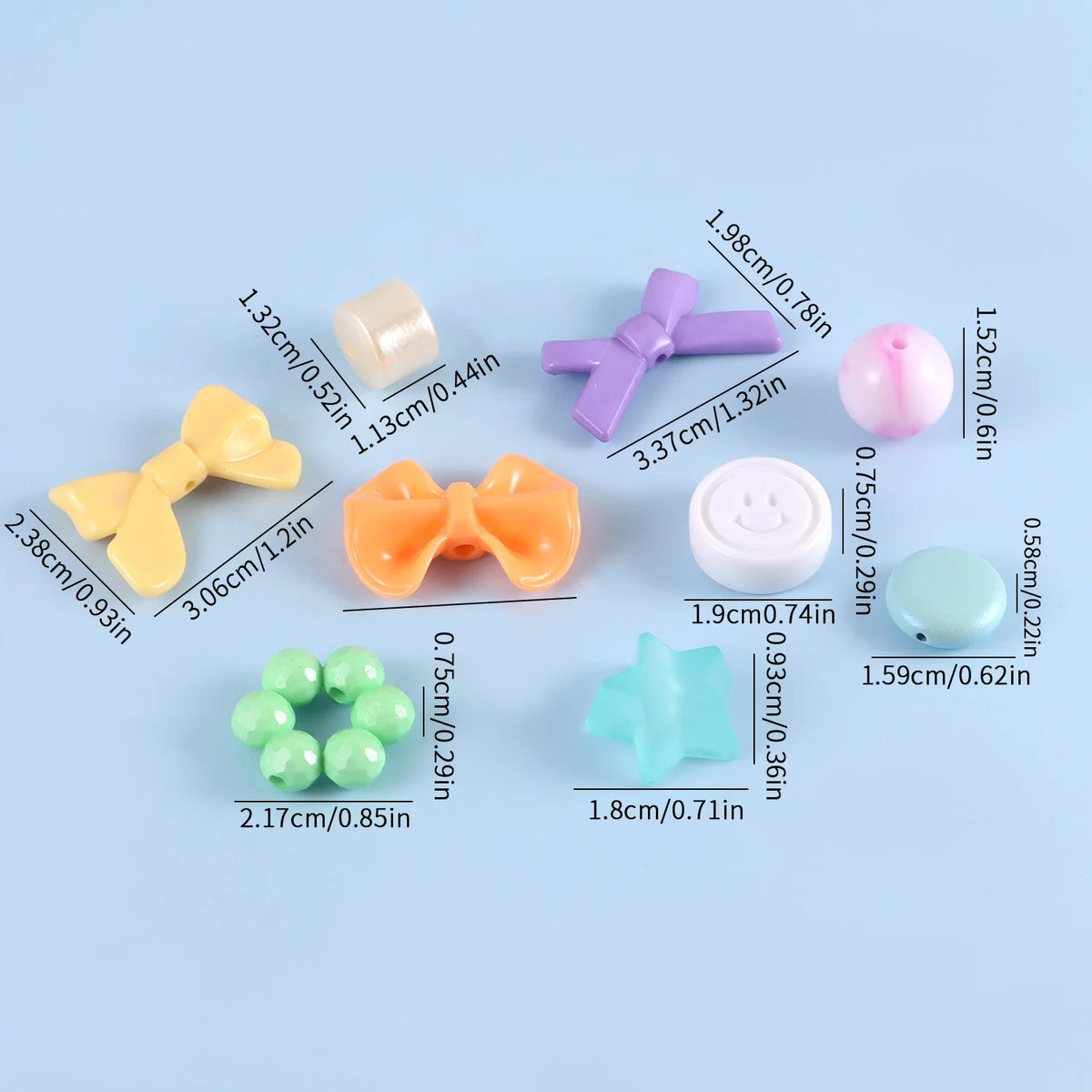 A collection of colorful acrylic beads and components for DIY jewelry making including various shapes and sizes.