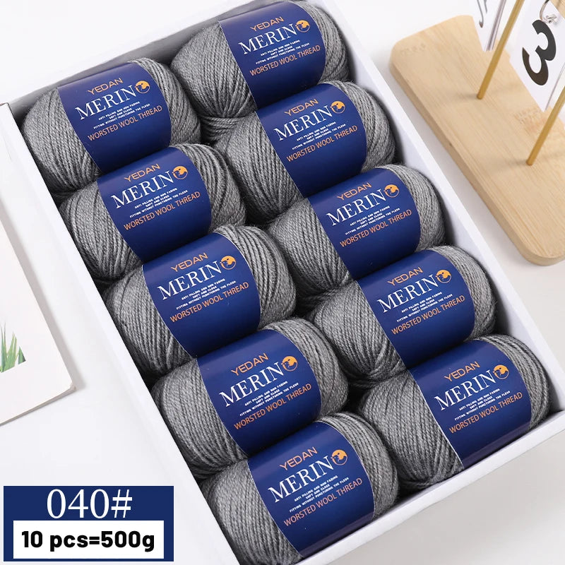 A box of YEDAN MERIN worsted wool thread yarn balls for knitting projects