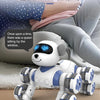 A white robot dog with blue lights and eight wheels is shown sitting on a person's lap.