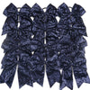 A pack of twelve dark blue glitter sequin pigtail bows for girls with elastic hair ties.