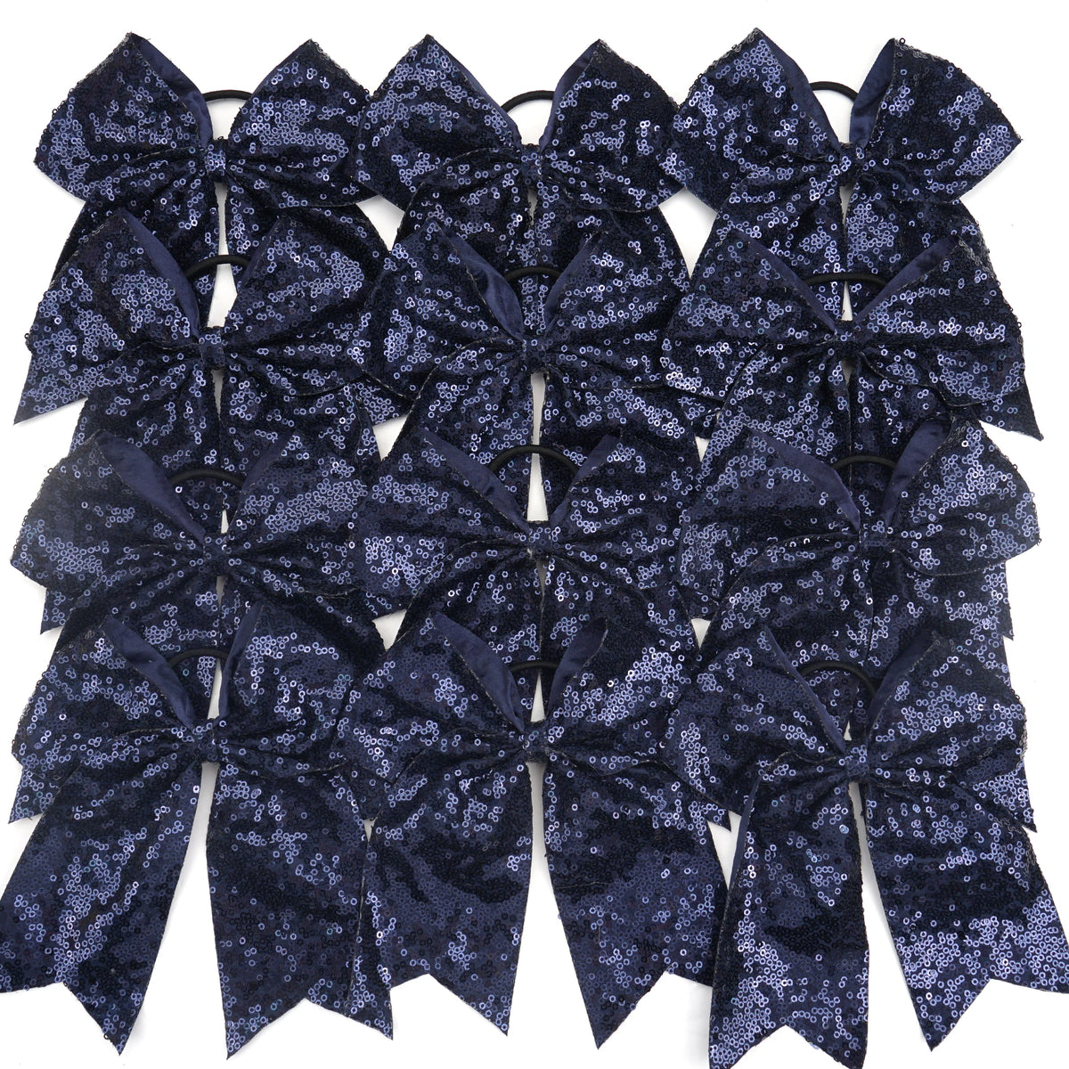 A pack of twelve dark blue glitter sequin pigtail bows for girls with elastic hair ties.