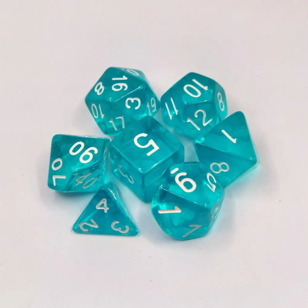 A collection of ten clear acrylic polyhedral dice showing various numbers and shapes for tabletop gaming.