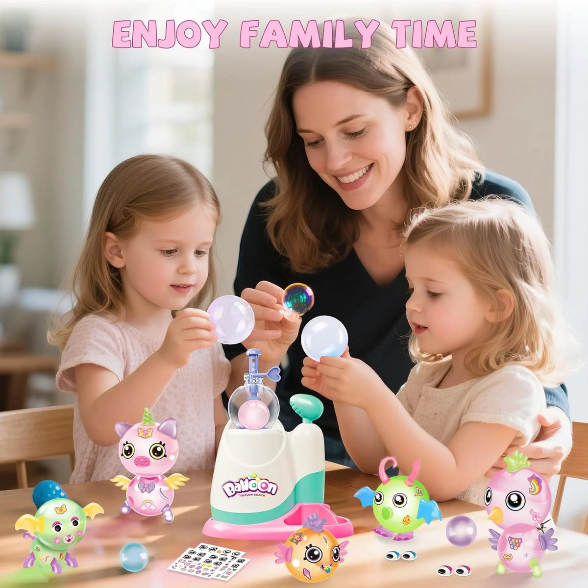 A mother and two young children are shown enjoying a DIY balloon animal craft kit with pump, stickers, and decorations.