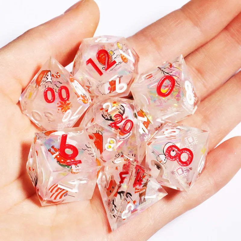 A hand holds a set of pink and clear resin polyhedral dice with numbers on them.