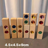 A set of wooden gemstone building blocks featuring acrylic crystals in various colors and sizes.