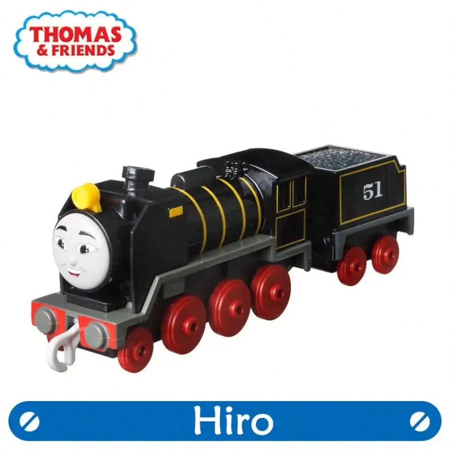 A black and yellow Thomas & Friends diecast train character toy with a white face and red wheels.
