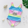 A vibrant, one-piece kids' swimsuit featuring a rainbow gradient of pink, blue, and green with a mermaid design.