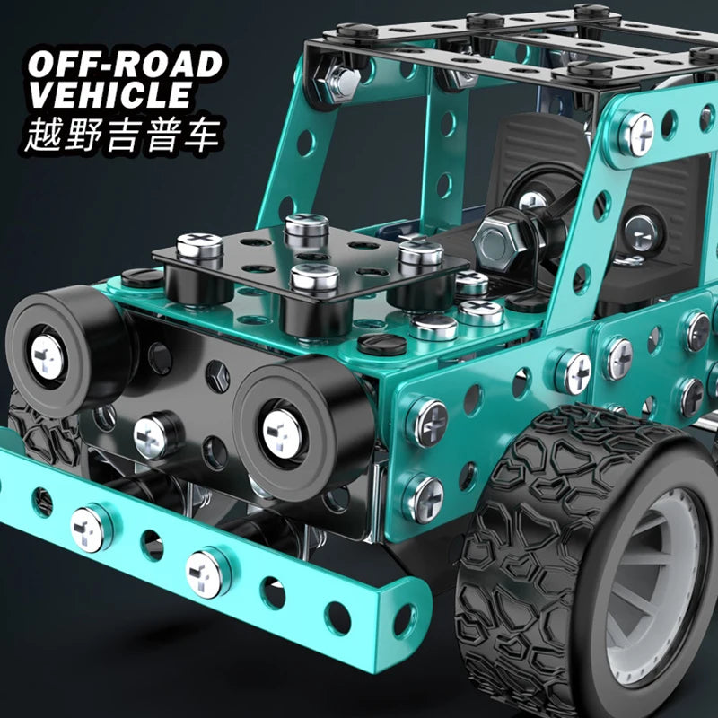 A teal metal off-road vehicle model kit featuring a chassis, wheels, and mechanical components.