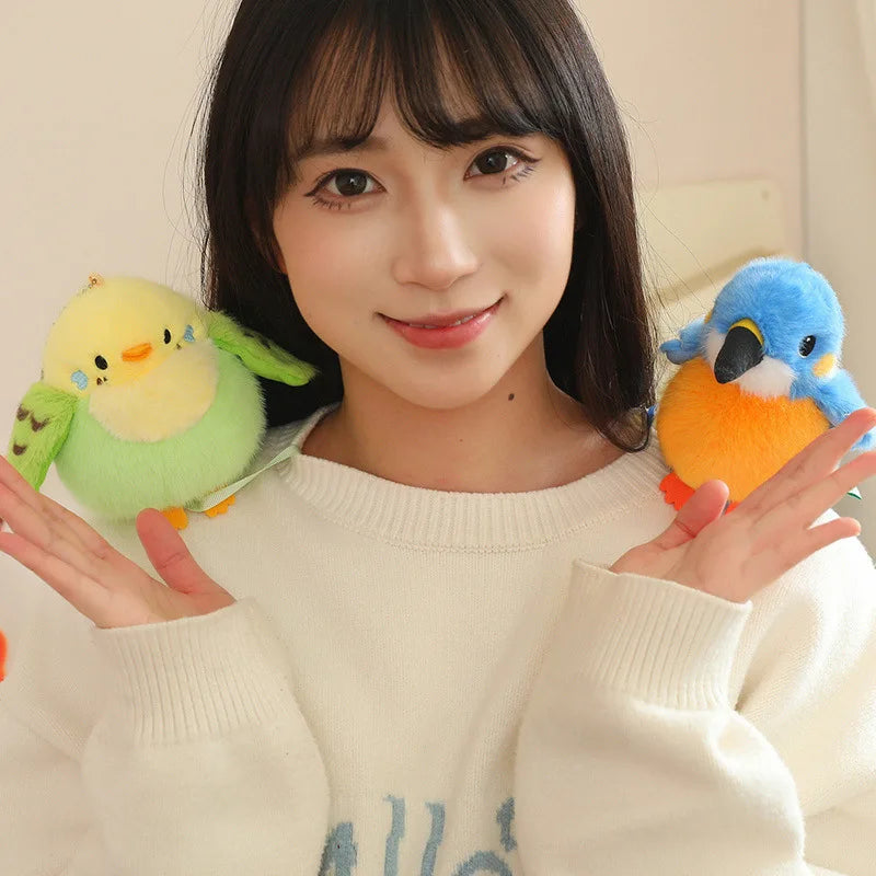 A young woman holds a yellow cartoon bird plush toy in front of her face.