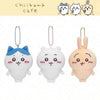 Three white and pink Chiikawa plush characters with dangling charms displayed against a light background.